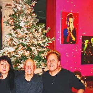 Artist Charlene Rooney with father-in-law Mickey Rooney and husband Mark Rooney. Palm Springs art exhibit Christmas 2012