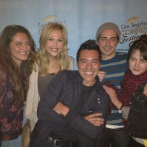 With the cast of 