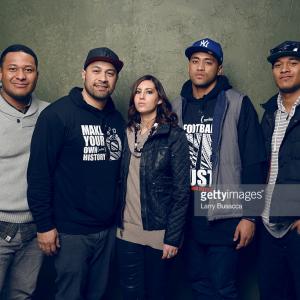 Erika Cohn and Tony Vainuku with three of the In Football We Trust subjects