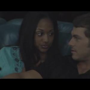 Shari JaNae Armogan and Clark Shawn Roberts get close in the horror film Devils Night