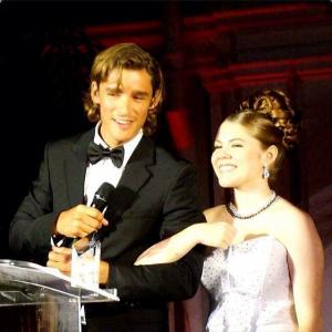 Annabelle Roberts and actor Brenton Thwaites on stage at the 5th annual Eurocinema/Hawaii International Film Festival awards.