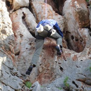 Mountain climber featured in A SICILIAN ODYSSEY, climbing Mt. Pellegrino Sicily