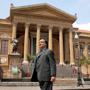 A SICILIAN ODYSSEY moment with Leoluca Orlando former Mayor of Palermo featured in A SICILIAN ODYSSEY in front of the world famous Teatro Massimo Palermo Sicily