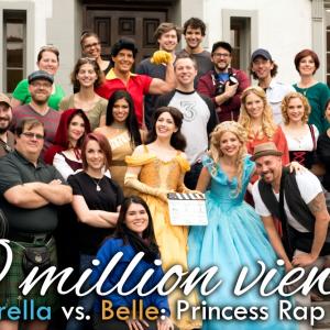 Whitney Avalon as Belle and Sarah Michelle Gellar as Cinderella with the cast and crew of the fourth Princess Rap Battle which got 10 million views in its first month