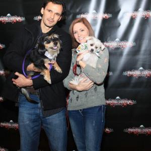 Alex Ballar with Tammy Dupal event creator posing with dogs for adoption at the All American Zombie Drugs Texas Premiere in support of Operation Kindness