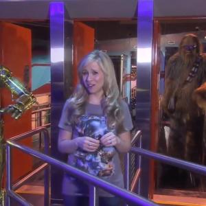 Still of Chris F Bartlett as C3PO and Ashley Eckstein for the Star Wars attraction Star Tours The Walt Disney Company