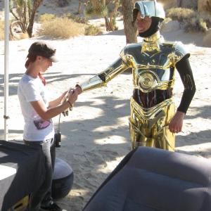Chris F Bartlett as C3PO on set with costume master Rachel Stasiak Bartlett With Lucasfilm for Toyota