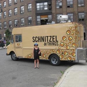 Lil Rhee hanging out at the Schnitzel  Things truck