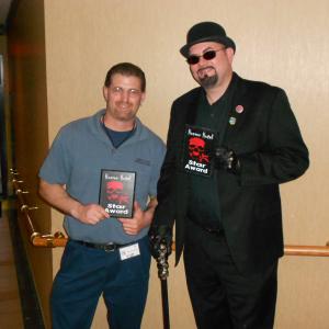 Accepting an Award along with Baron Bloodstorm at the 2012 Horror Hotel Film Convention