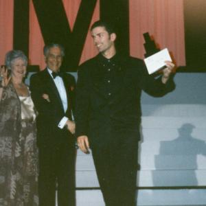 Sacha Pommepuy (far right) accepting an award for dramatic acting at the IMTA.