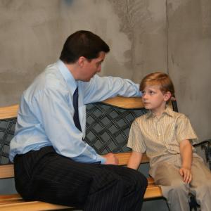 Kendall (Lawrence Greeley) with his dad (D.C. Douglas) in the feature film SHELTER.