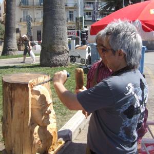 Boris Acosta sculpting wood during the Cannes 2010 film festival.