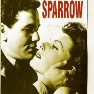 Maureen O'Hara and John Garfield in The Fallen Sparrow (1943)