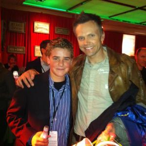 Justin with Joel McHale at the Muppet premier