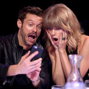 Ryan Seacrest and Taylor Swift at event of IHeartRadio Music Awards (2015)