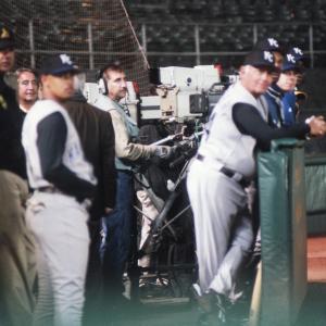 Another candid shot of Alexander operating the Oakland A's Sony Stadium HDTV Camera on the set of Sony Pictures Moneyball as the coaches, umpires and players track da ball..