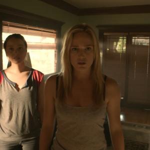 Still of Caity Lotz and Camilla Luddington in The Pact II 2014