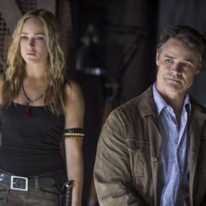 Still of Dylan Neal and Caity Lotz in Strele (2012)