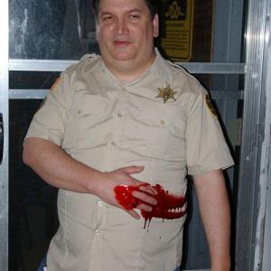 James Magnum Cook as Sheriff Jake Madison on the set of Bloody Sisterly Love