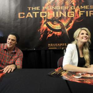 Stephanie Leigh Schlund and Alan Ritchson during 'The Hunger Games: Catching Fire' National Victory Tour on November 6, 2013 in Houston, Texas