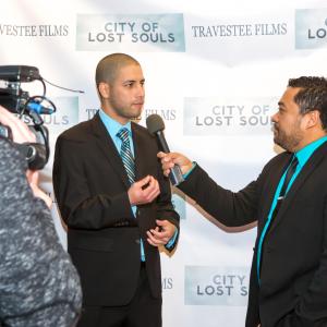Director Jason Baustin getting interviewed at the premiere of 