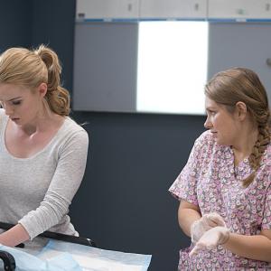 Still of Merritt Wever and Betty Gilpin in Nurse Jackie (2009)