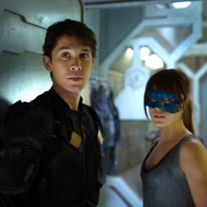 Still of Bob Morley and Marie Avgeropoulos in The 100 2014