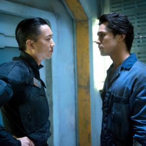 Still of Terry Chen and Bob Morley in The 100 (2014)