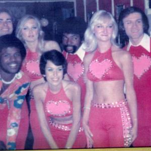 Susan 2nd from right singing with the Doodle Town Pipers 1977