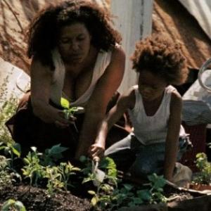 Scene from Benh Zeitlins Beasts of the Southern Wild Quevenzhane Wallis as Hushpuppy and Gina Montana as Miss Bathsheeba the school teacher