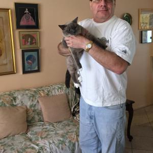 Barry holds mom's kitty cat, Miss Kitty.