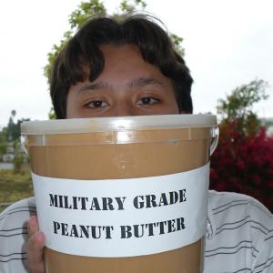 Peanut Butter Girl Adrian Schemm with Military Grade bucket of Peanut Butter!