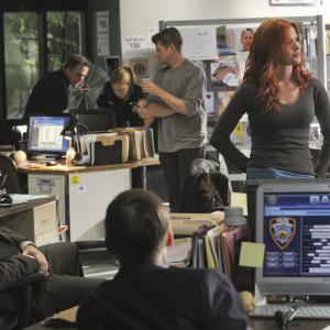 Still of Poppy Montgomery and Mike Costello in Unforgettable (2011)