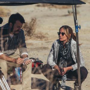 Director Ashley Avis working with cinematographer Garrett OBrien on the set of Deserted