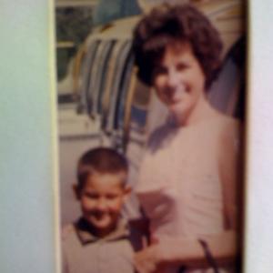 As a little boy with mother at Disneyland