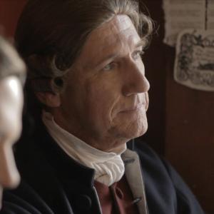 Set shot of Patrick Finerty in COURAGE NH as recurring character Justice William Bramley