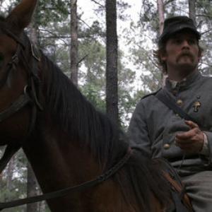Julian Adams as Captain Robert Adams atop Count of War in The Last Confederate The Story of Robert Adams