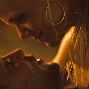 Still of Taylor Kitsch and Brooklyn Decker in Laivu musis (2012)