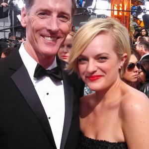 Kenneth Kemp and Elizabeth Moss at 2013 Emmys