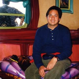 Edmund K Lo sitting on Pluto Dog Bed at Mickey Mouse House on October 2011. (Disneyland)