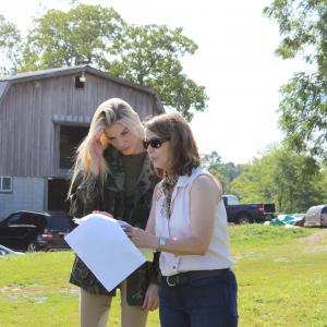 Colleen reviews a scene with Melissa Martinelli Sunny Hill on the set of the HAPPY ACRES pitch trailer which is an abridged version of her screenplay which she wrote produced and directed