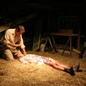 Still of Ashley Bell and Patrick Fabian in The Last Exorcism (2010)
