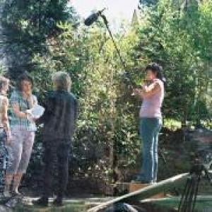 Lynn Denton directing actors Colleen June McQuaide and Mary Kickel on set of Scumbling