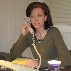 Angela Oberer as Agent Landis in Jason Macs The Identity