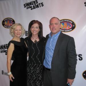 TV Host Catherine Trail Angela Oberer and Film Producer Leon Dunn at the Sinners and Saints Premiere 2010