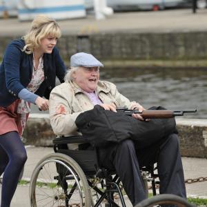 Still of Dudley Sutton and Georgia King in Cockneys vs Zombies 2012