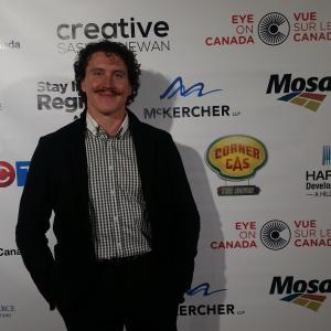 Dustin MacDougall walking the Red Carpet at the Regina SK premiere of Corner Gas The Movie