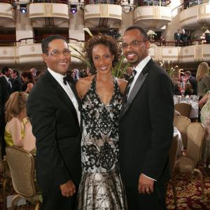 Joan Baker arm and arm with Bryant Gumbel and husband Rudy Gaskins- Guests of the Rita Hayworth Gala at the Waldorf Astoria.