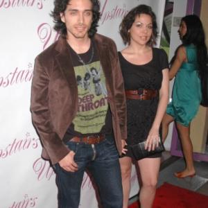 Grand Opening of the Upstairs Boutique in Hollywood. Elizabeth and husband Josh Keaton.