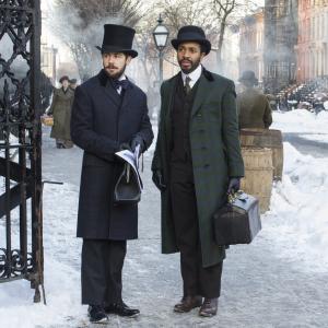 Still of Michael Angarano and André Holland in The Knick (2014)